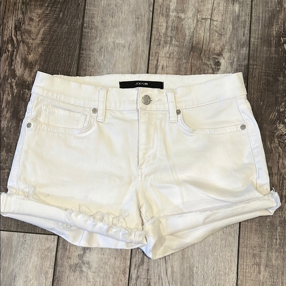 White Jean Shorts with Cuffed Hems and Distressed Look